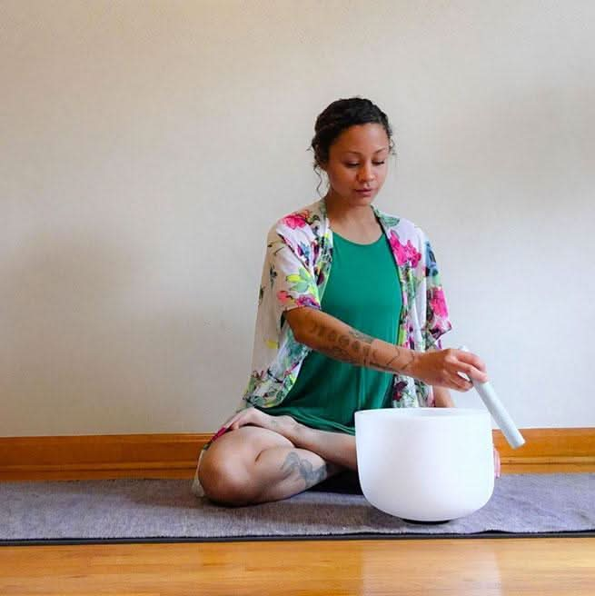 playing Crystal-Chakra-Singing-bowl